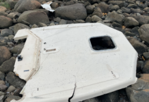 Mengder med vrakgods fra båt drev på land ved nasjonalparken på Herføl